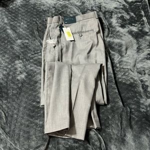 New with tags Perry Ellis men’s dress pants size 38x30.